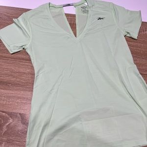 My favorite Reebok shirt of my collection NWOT SIZE SMALL